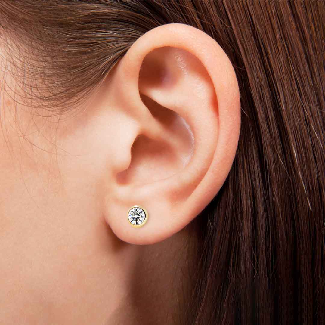 Kultaiset korvakorut 5mm kirkkaalla zirkoniakivellä, 14K keltakulta - Image 3