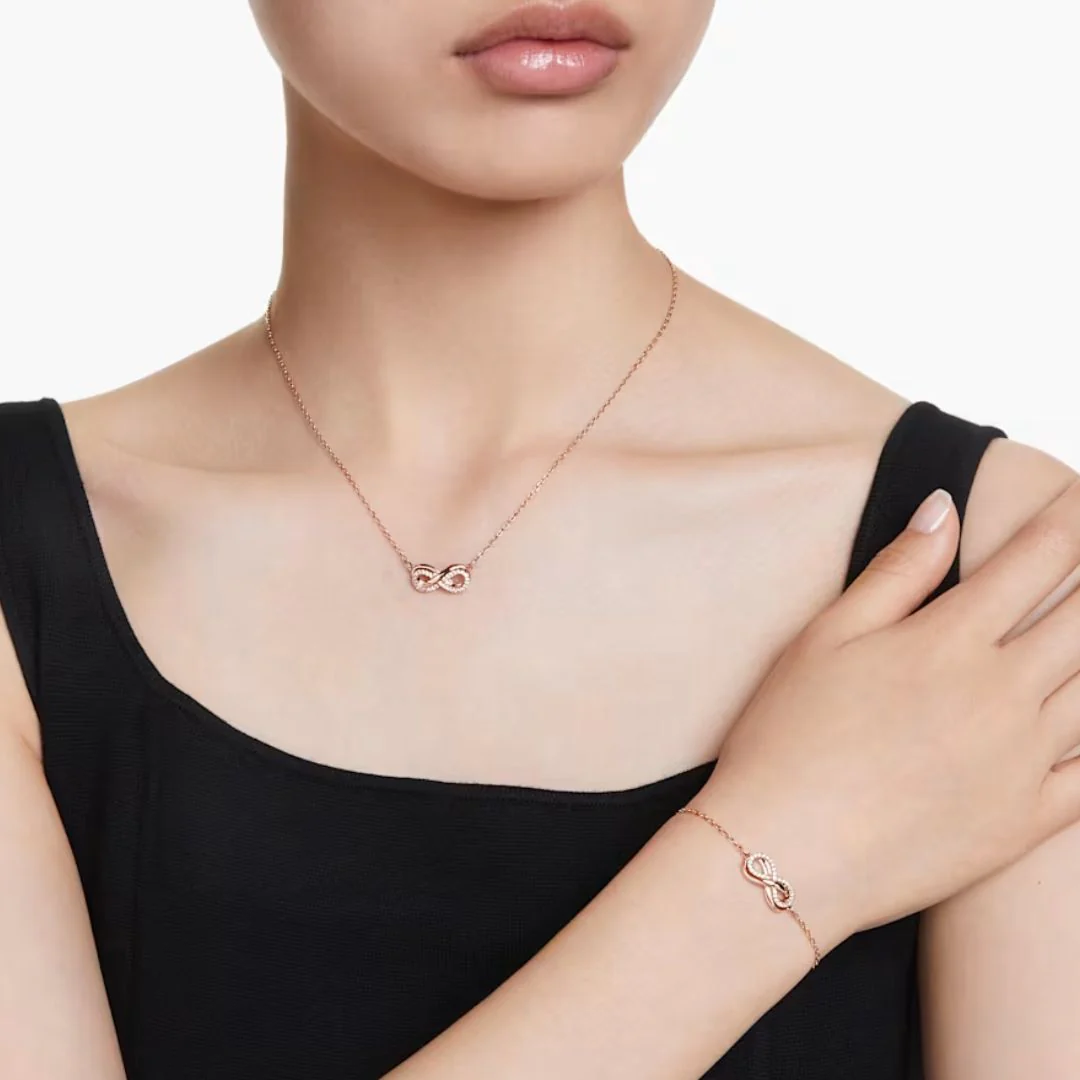 Swarovski Hyperbola Infinity riipus ja rannekoru, ruusukullanväri ja kirkkaat kristallit 5682483 - Image 2